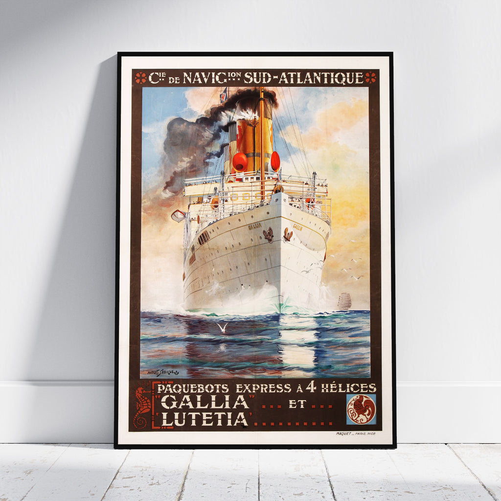 A framed vintage travel poster leaning against a white wall on a light floor. The poster shows a large ocean liner sailing through blue water under a warm sky, with French text reading 'C.