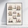 A framed vintage nautical art print featuring nine detailed illustrations of historical sailing ships on an off-white background, leaning against a white wall on a light wood floor.