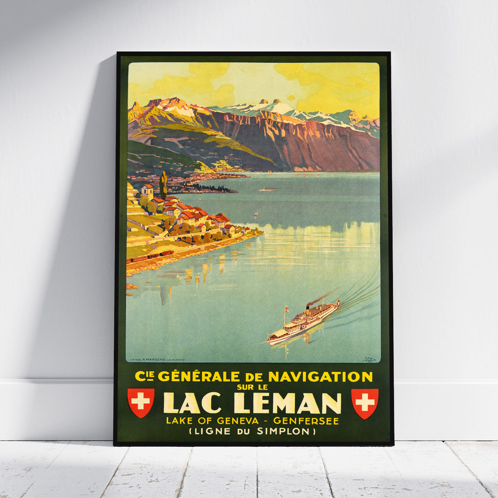 A framed vintage-style travel poster leaning against a white wall on a light floor. The poster depicts a scenic lake and mountain landscape with the text 'C· Générale de Navigation sur le Lac Leman' and Swiss flag motifs.