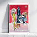 A framed cartoon art print leaning against a white wall on a light wood floor. The print features a red outer-space background with a tall rocket ship, a giant figure in a yellow suit, and several smaller figures carrying boxes labeled 'LEMON PART'.