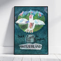 A framed art print leaning against a white wall on a light floor. The artwork shows a white bird with pink and blue accents flying over green hills and mountains, with the text 'back to nature' and 'SWITZERLAND' on a dark teal textured background.