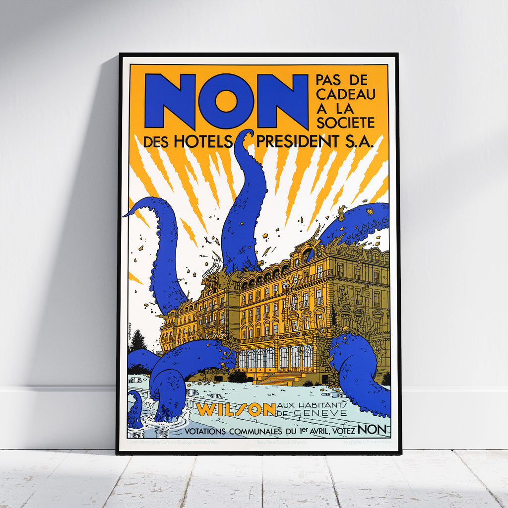A framed vintage-style travel poster leaning against a white wall on a light floor. The poster features bold blue typography reading 'NON' and 'PAS DE CADEAU A LA SOCIETE DES HOTELS PRESIDENT S.