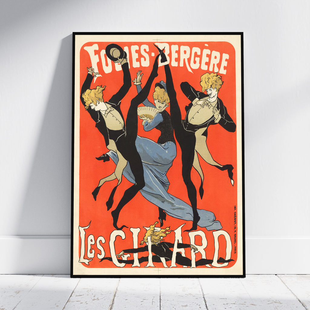 A framed vintage-style poster leaning against a white wall on a light floor. The poster features three dancing figures in black and beige costumes with a blue dress, set against a vivid red-orange background, with large cream text reading 'Foules Bergère' at the top and 'Les Citadins' at the bottom.