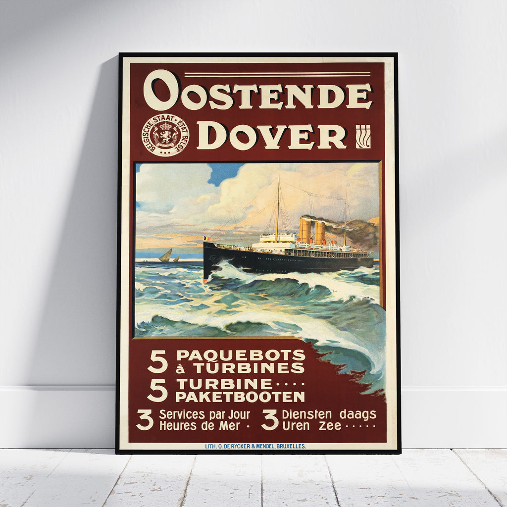 A framed vintage travel poster advertising Oostende Dover, leaning against a white wall on a light wood floor. The poster features a cream and dark red design with an illustration of a passenger liner at sea.