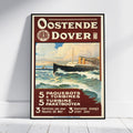 A framed vintage travel poster advertising Oostende Dover, leaning against a white wall on a light wood floor. The poster features a cream and dark red design with an illustration of a passenger liner at sea.
