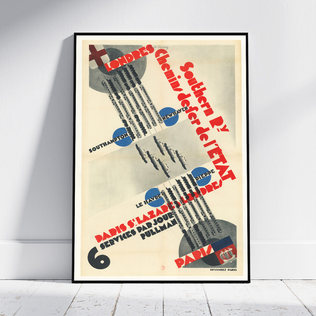 A framed vintage travel poster for Southern Railway from Paris to London, leaning against a white wall on a light wood floor. The poster features a cream background with bold red typography, black graphic lines, and blue circular accents.