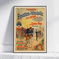 A framed vintage cycling poster leaning against a white wall on a light wood floor. The poster features colorful illustrated cyclists, text in French, and a cream background with red, blue, and orange details.